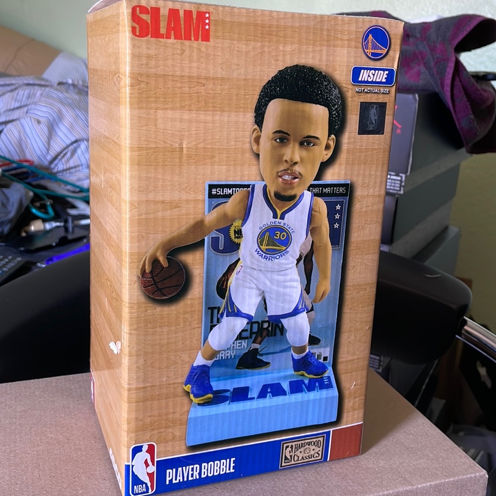 Slam Limited Edition Stephon Curry Bobblehead.